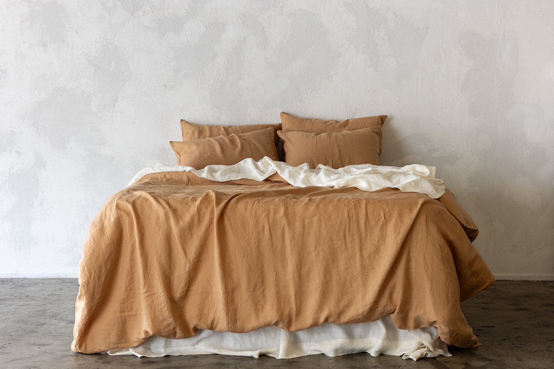 100% French flax linen sheets and duvet cover on a bed